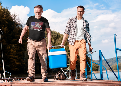 Picture of 2 fisherman going fishing while wearing American Heritage Gift's Reel American Tri-Blend T-Shirt. Gifts for fisherman.